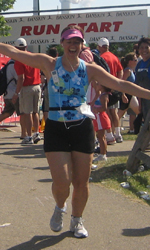 Janet smiles for her family as she starts her favorite part of the triathlon!